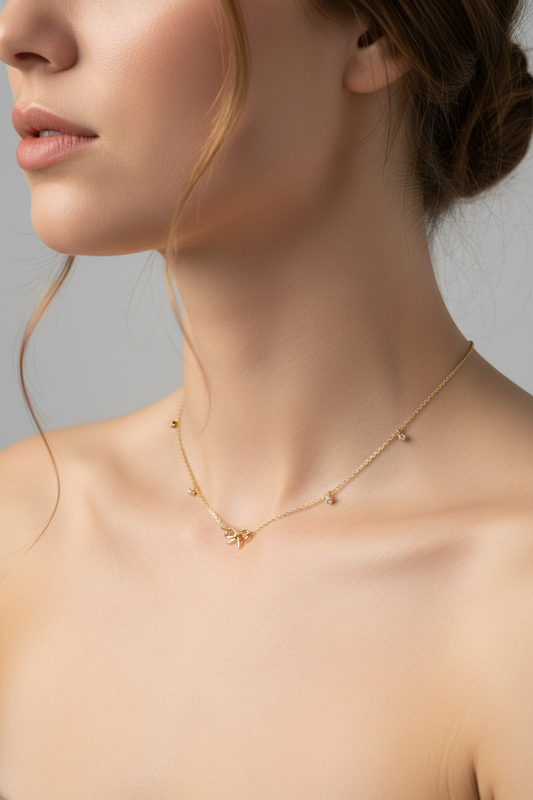 R1-57 726GD GOLD BOW NECKLACE