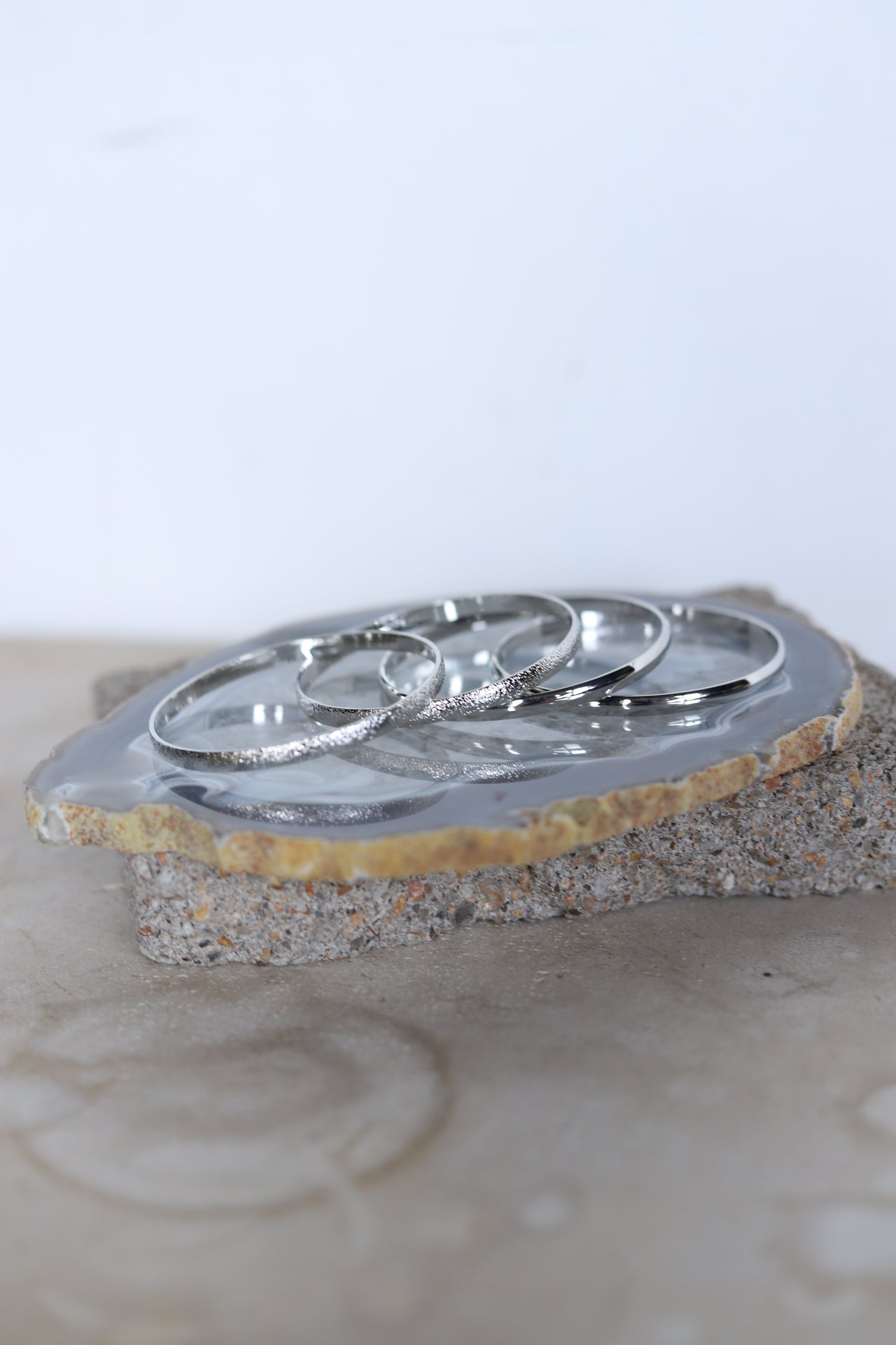 164 R1-39 4 SET FAUX SILVER BANGLE SET