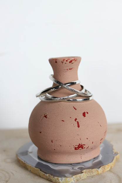 164 R1-39 4 SET FAUX SILVER BANGLE SET