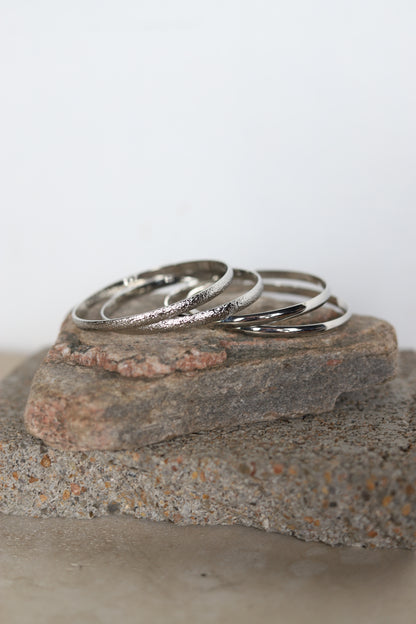 164 R1-39 4 SET FAUX SILVER BANGLE SET