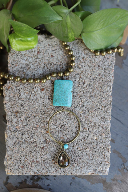 82323 N1-2 AQ GOLD BEAD NL WITH TURQ STONE AND CRYSTAL DANGLE