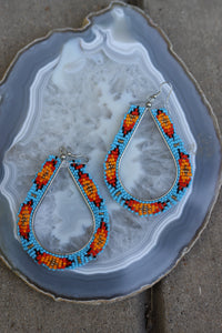 1146 LARGE CUTOUT OVAL TRIBAL ER