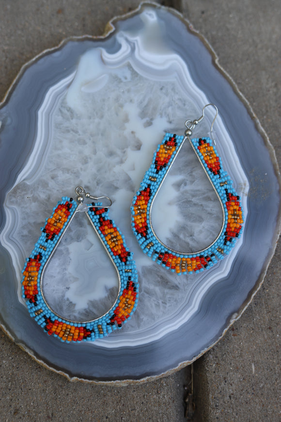 1146 LARGE CUTOUT OVAL TRIBAL ER