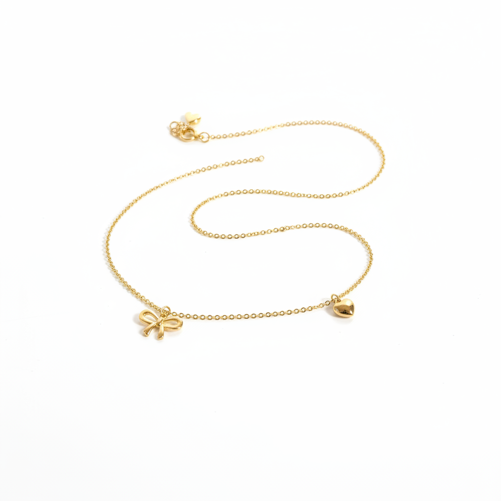 R1-68 718 GOLD BOW AND HEART NECKLACE