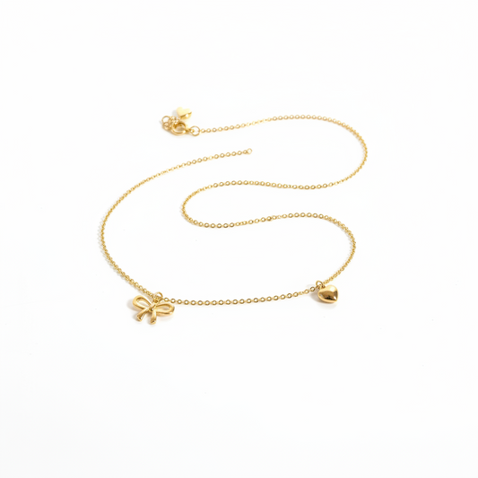R1-68 718 GOLD BOW AND HEART NECKLACE