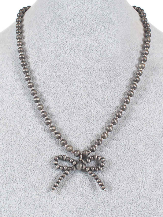 1309(1) Gunmetal Beaded Bow Pendant Necklace