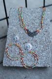 0035 T154 MULTI 3S SEED BEADW/ FAUX SILVER CENTER BEADS