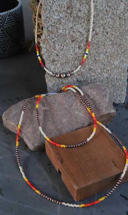 0799 HH163 BONE WESTERN GRADUATED FAUX SILVER SEED BEAD NL