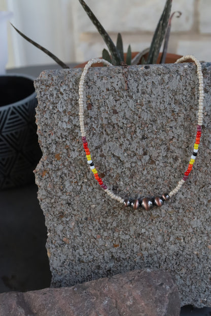 0799 HH163 BONE WESTERN GRADUATED FAUX SILVER SEED BEAD NL