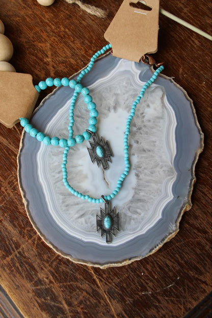 32211 B56 SILV STRETCH BR W/SILVER AND TURQ CHARM